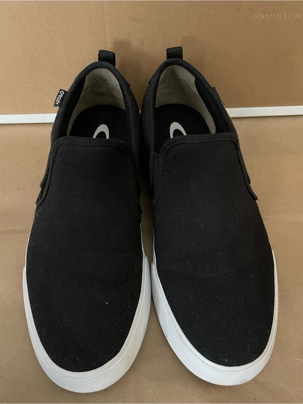 Oakley Black Canvas Slip-On Sneakers with White Soles size 9